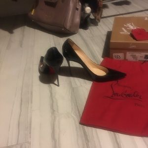Black patent Christian Louboutin decolette